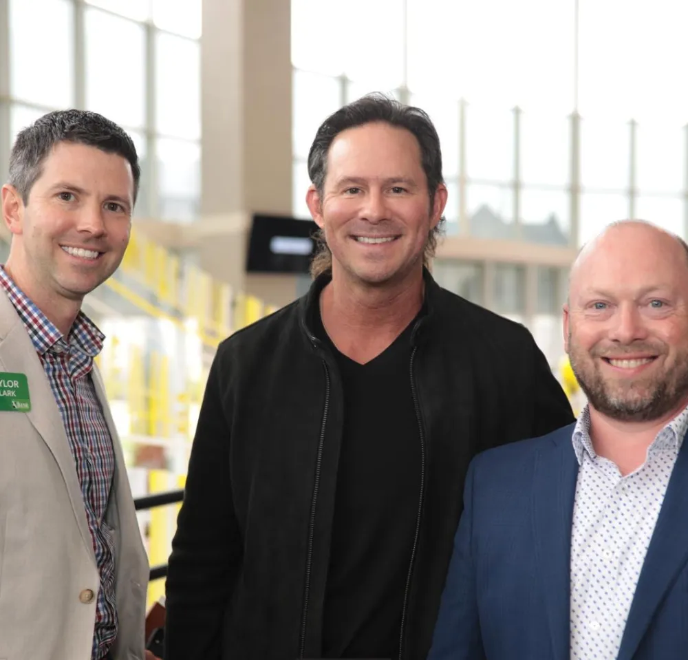 Brett Payne with business owners at a networking event