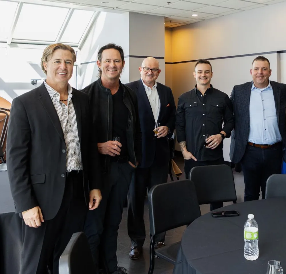 Brett Payne with community and business leaders at an event